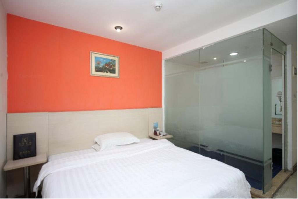 Yixin Business Hotel Cantón Exterior foto