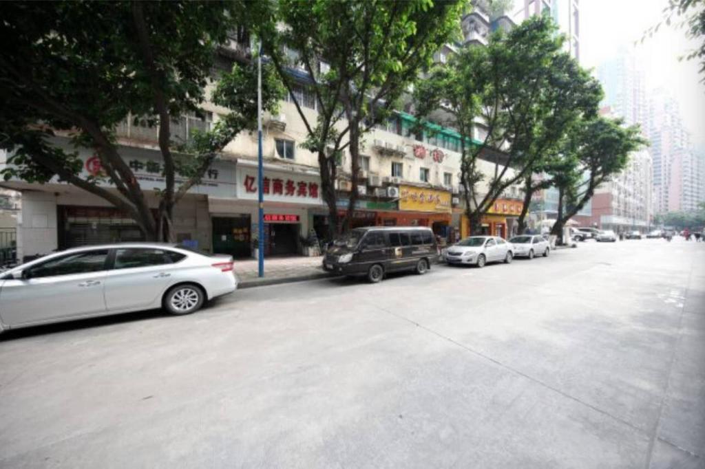 Yixin Business Hotel Cantón Exterior foto