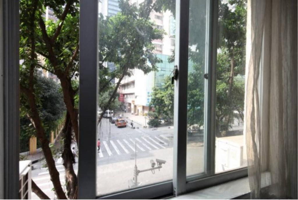 Yixin Business Hotel Cantón Exterior foto