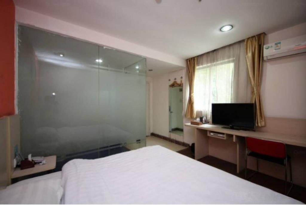 Yixin Business Hotel Cantón Exterior foto