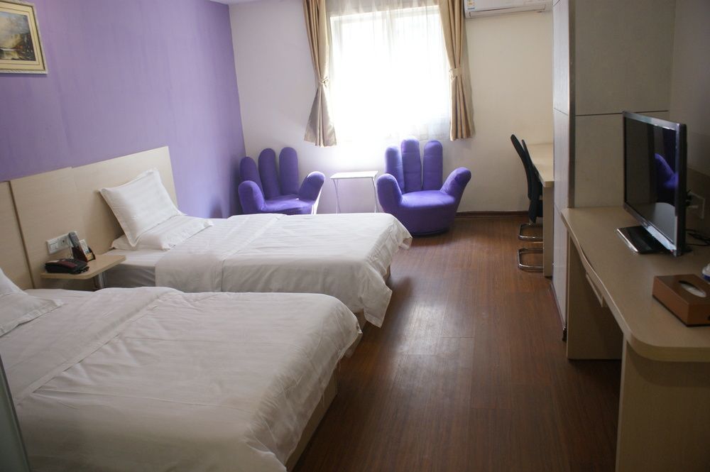 Yixin Business Hotel Cantón Exterior foto